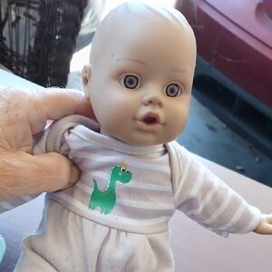 ADORA Baby Doll with Striped Outfit and Dinosaur Design